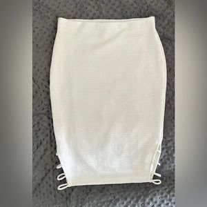 White pencil skirt with laser cut sides
